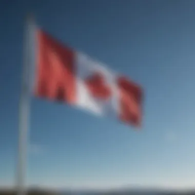 Proud Display of the Canadian Flag Canadian flag waving in the wind against a blue sky