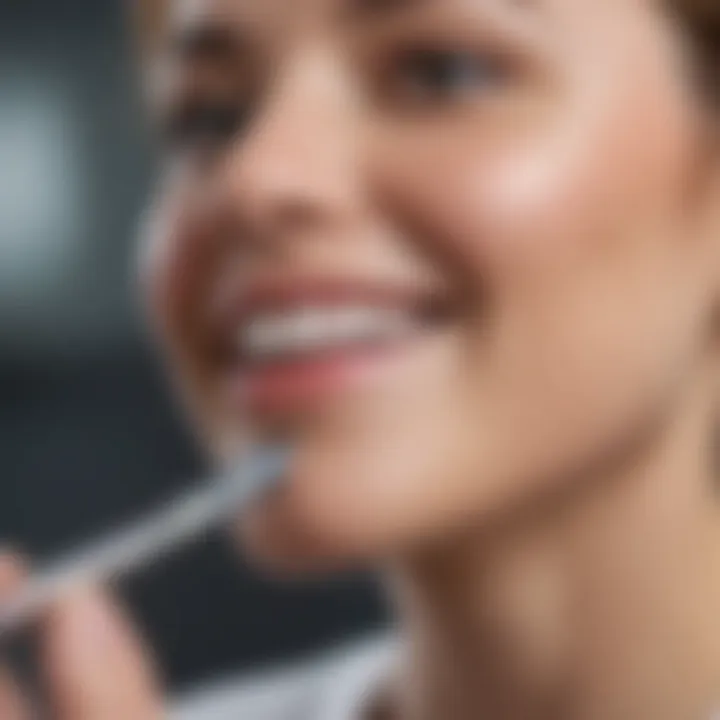 Dental Hygienist Using Ultrasonic Scaler for Cleaning