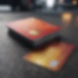 A credit card with a car rental agreement in the background